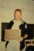 kevingurrholdingthecousteuplaque_small.jpg
